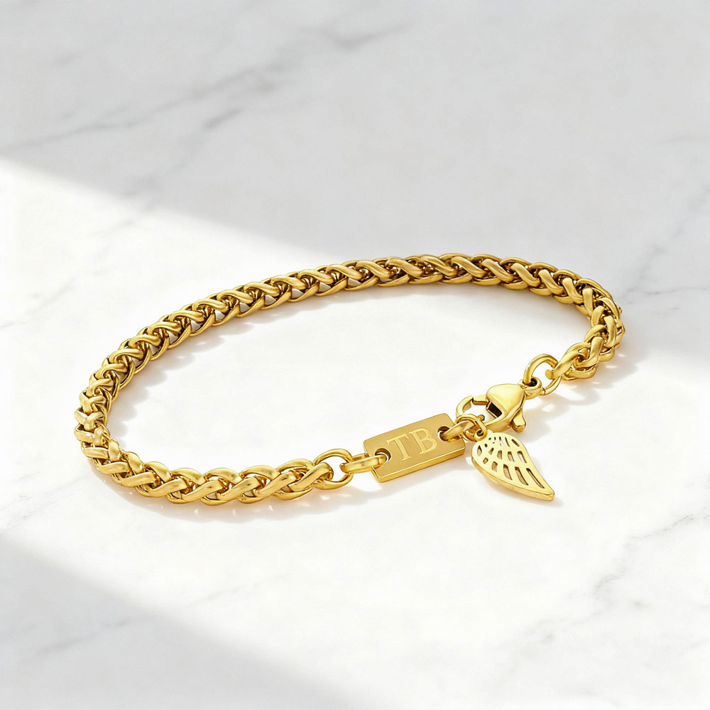 pulseira-homem-pendente-asa Pulseira masculina dourada com pendente em forma de asa