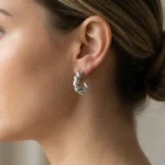 Brincos mulher torcidos em aço inoxidável prateados