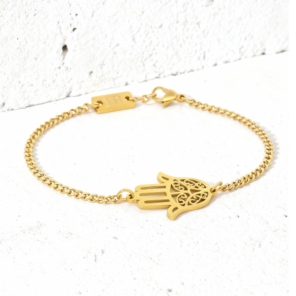 pulseira-dourada-mao-de-fatima Pulseira para homem mão de Fátima em aço dourado.